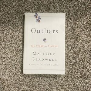 Hardcover Outliers by Malcom gladwell